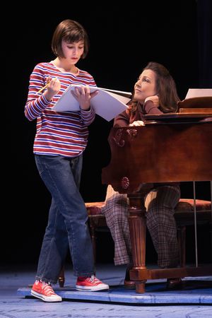 Small Alison (Lila Gold) shares a school project with her mother Helen (Crissy Guerrero) in â€"Fun Home,†@ BroadwayWorld Small Alison (Lila Gold) shares a school project with her mother Helen (Crissy Guerre Photo