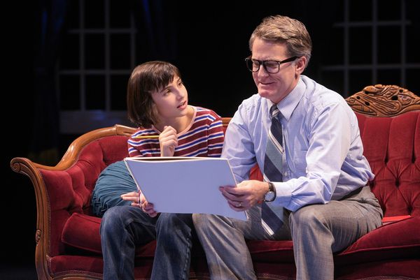 Small Alison (Lila Gold) receives advice on how to improve her school project from fa Photo