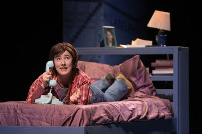 Medium Alison (Erin Kommor) calls home from college in â€œFun Home,â€ Photo