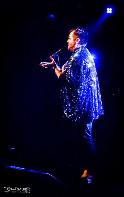 Michael Cummings sings Wealth from The Apple Tree. Photo