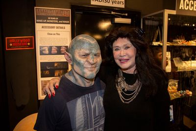Barbara Van Orden posses with finished make-up applications Photo