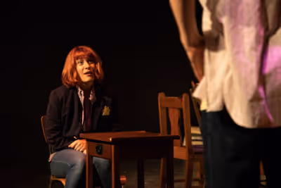 Tara Rose (Sarah Elizabeth Grace) at Kemeny Academy in the past.

Photo Credit: Eliza Photo