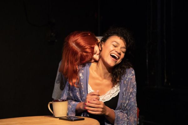 Marital affection between Tara (Sarah Elizabeth Grace) and Rebecca (Morgan McGuire).
 Photo