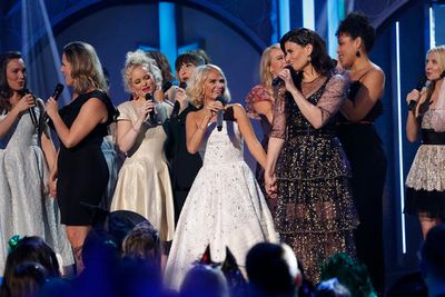Kristin Chenoweth and Idina Menzel with former and current Glindas and Elphabas Photo