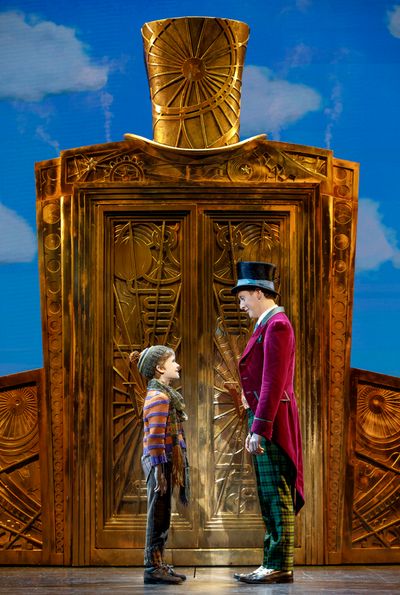 Henry Boshart as Charlie Bucket and Noah Weisberg as Willy Wonka Photo