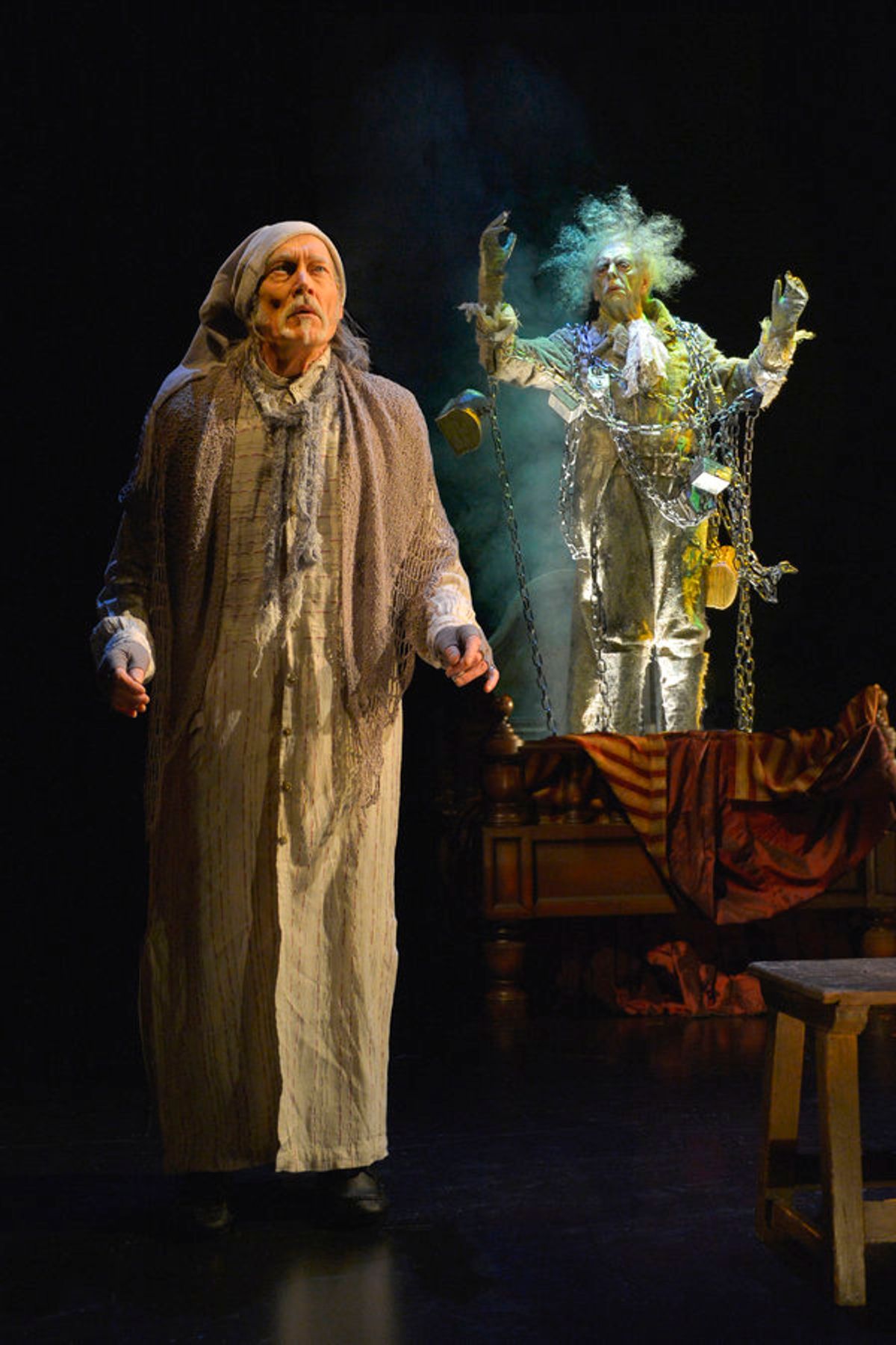 James Carpenter (left) as Ebenezer Scrooge (at select performances) and Ken Ruta as the Ghost of Jacob Marley at 