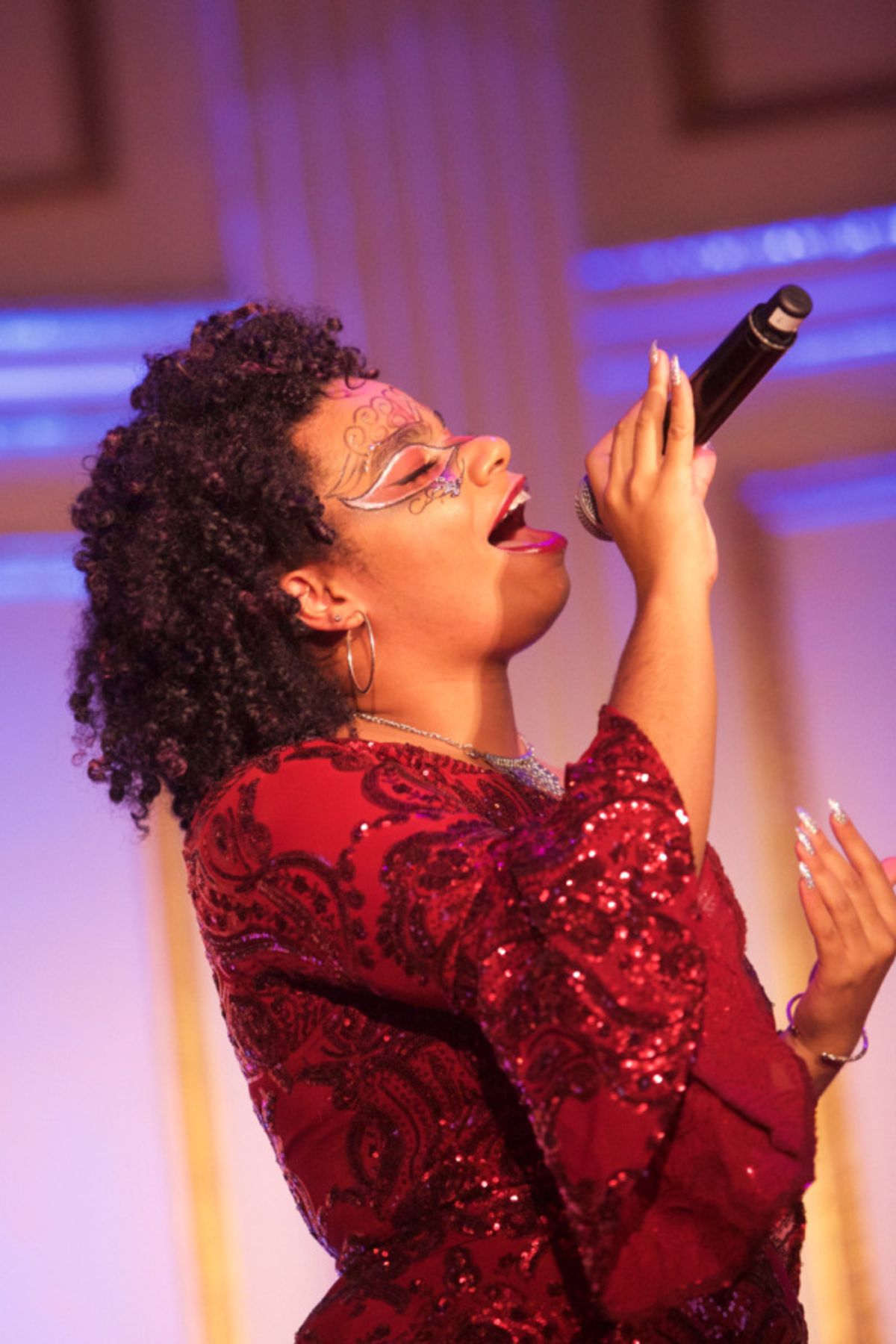 HSA alumna and The Voice finalist, We McDonald performs at the 2018 HSA Masquerade Ball at 