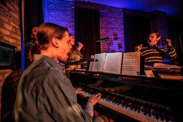 Erik Pearson as â€œGideonâ€ at piano (L to R);behind piano (L to R) Darilyn  Photo