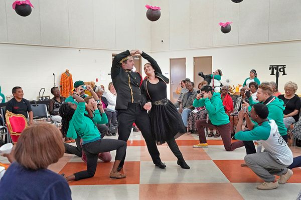 Jake Millgard as Theseus and Samantha Sutliff as Hippolyta with the company; in a sce Photo