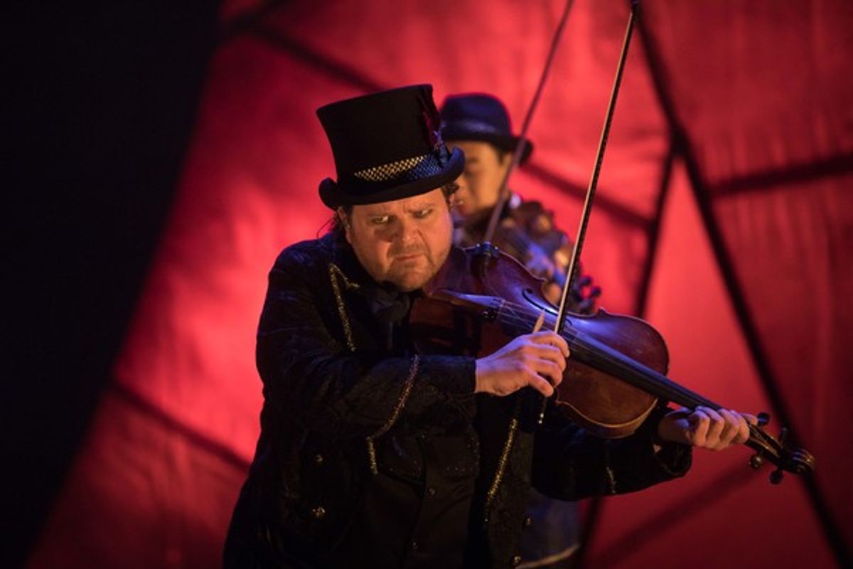 Ralph Farris in Circus: Wandering City. Photo by Max Gordon. at 