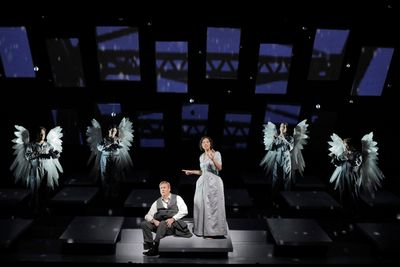 William Burden as George Bailey and Golda Schultz as Clara (center) with Amitai Pati, Photo