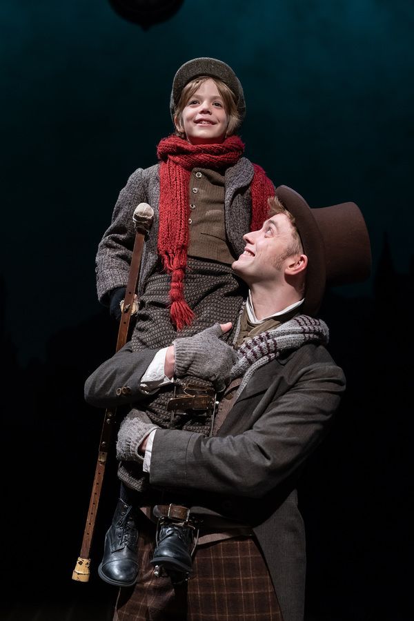 Aidan Fuller as Tiny Tim and Gregory Maheu as Bob Cratchi Photo