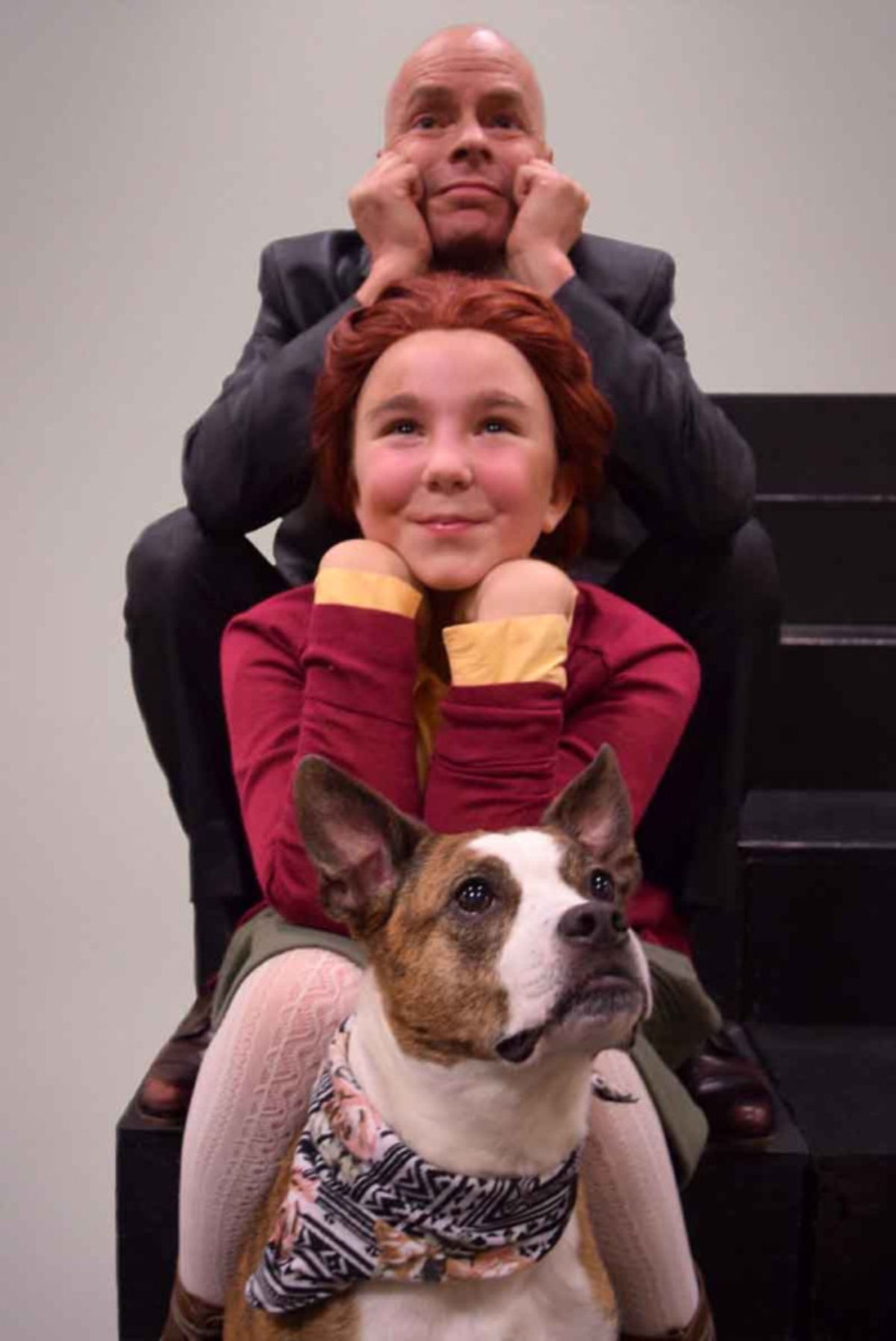 Osborn Focht as Oliver Warbucks, Gracie Nagle as Annie and Clementine as Sandy at 