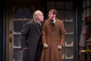 Larry Yando (Ebenezer Scrooge) and Thomas J. Cox (Bob Cratchit) Photo