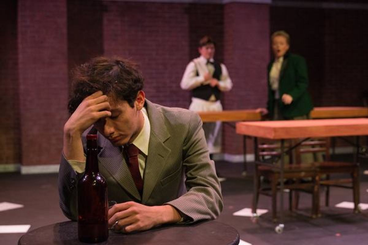 PARKER DEAN (Frank Church) [foregound) and KYLE YODER (Ensemble) with CHRISTINE CHOATE (Andrea Borland) [background] from the Lakewood Playhouse Production of 'YES, VIRGINIA, THERE IS A SANTA CLAUS.' at 