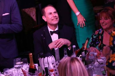Prince Edward, Earl of Wessex (C) and Janet Ellis (R) Photo