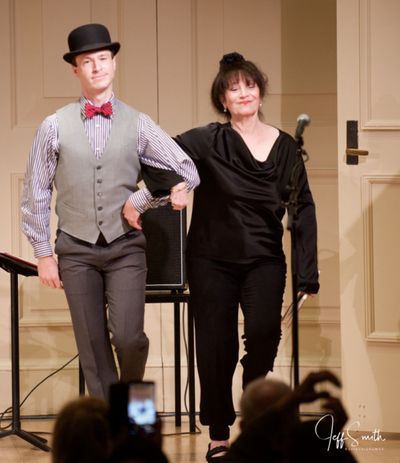 Cary Tedder shuffles on stage with Eileen Bluestone Sherman (Emmy Award-winning lyric Photo