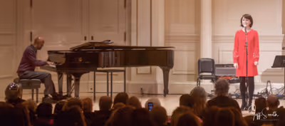 Sara Esty performs Mrs. Rockwell with Musical Director Timmothy Graphenreed at the pi Photo