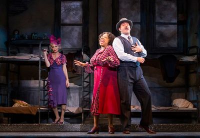 Cynthia Jones as Miss Hannigan, Cheyenne Casebier as Lily St. Regis, and Dane Stoking Photo