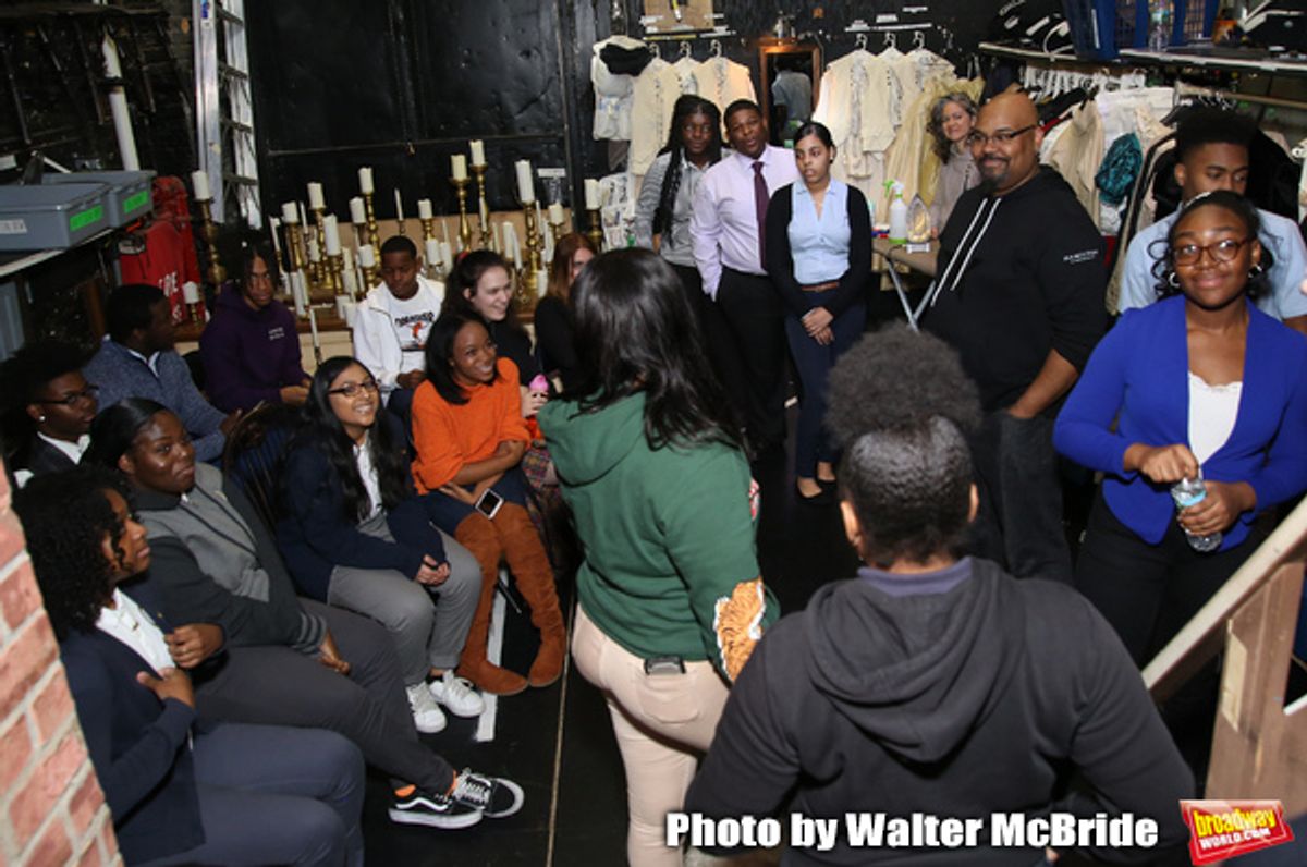 James Monroe Iglehart backstage with student performers at 