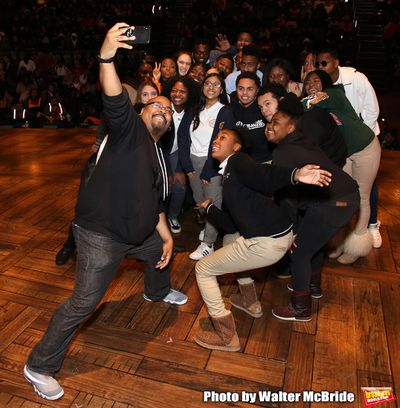 James Monroe Iglehart with student performers Photo