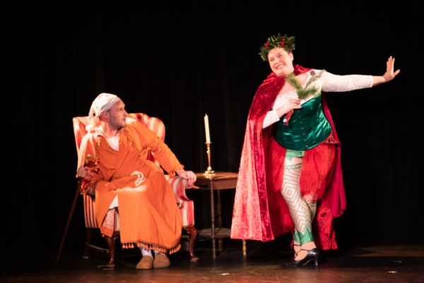 Scrooge (Eric Fletcher) and Ghost of Christmas Present (Kelsey Riker)

Photo: Martin  Photo