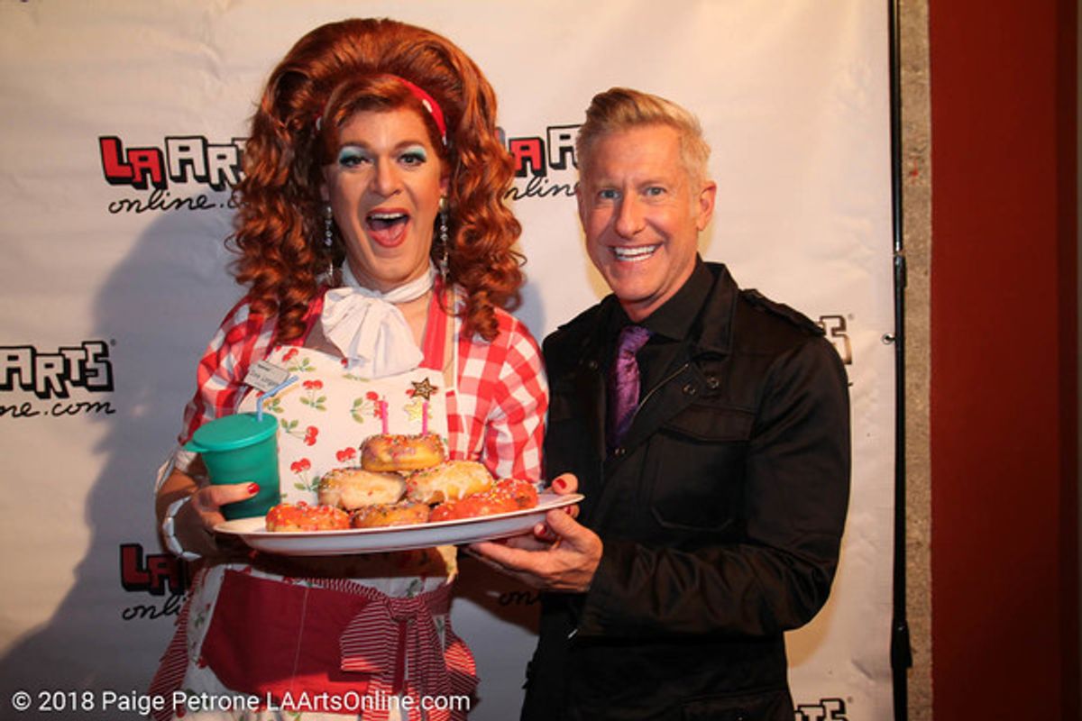 Dixie Longate and Joe Everett Michaels with cake
 at 