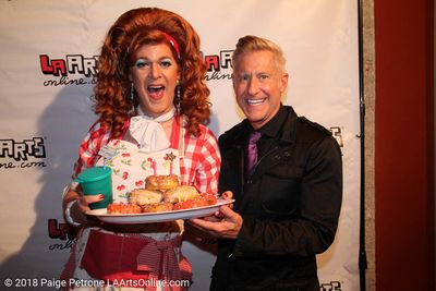 Dixie Longate and Joe Everett Michaels with cake
 Photo