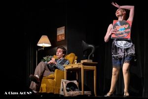 Lee Rosenthal as Man In Chair and Tagan Vaz-Barros, Ensemble Member, in the Catâ€�&iquest;� Photo