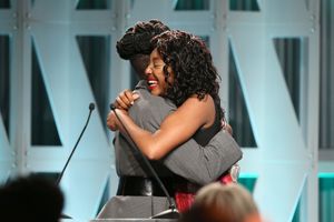 Lupita Nyong'o (L) presents The Black Panther Scholarship to Kalis Coleman @ BroadwayWorld Lupita Nyong'o (L) presents The Black Panther Scholarship to Kalis Coleman Photo