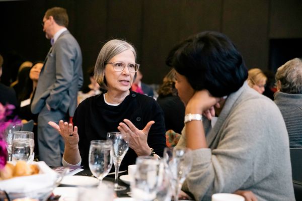 Steppenwolf ensemble member Amy Morton talks with Gwendolyn Perry Davis 
 Photo
