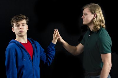 Dylan Weand as Christopher John Francis Boone and Logan Beutel as Mr. Ed Boone

photo Photo