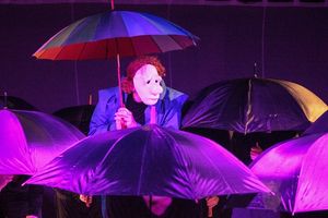 Glenn Wallis, centre, tries to find shelter from life in L'Appel Du Vide. Photo
