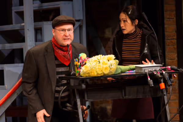 Phillip Taratula (Tim Allgood) and Kimiye Corwin (Poppy Norton-Taylor) Photo