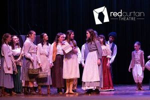 Factory worker (Emmarie Wilson) causes trouble for Fantine (Rylee Wills) @ BroadwayWorld Factory worker (Emmarie Wilson) causes trouble for Fantine (Rylee Wills) Photo