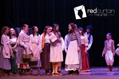 Factory worker (Emmarie Wilson) causes trouble for Fantine (Rylee Wills) Photo