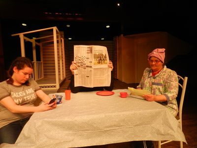 Raynelle Turpin (Sunshine Rishel) reads a letter to Bud Turpin (Mike Stubbs) and Deli Photo