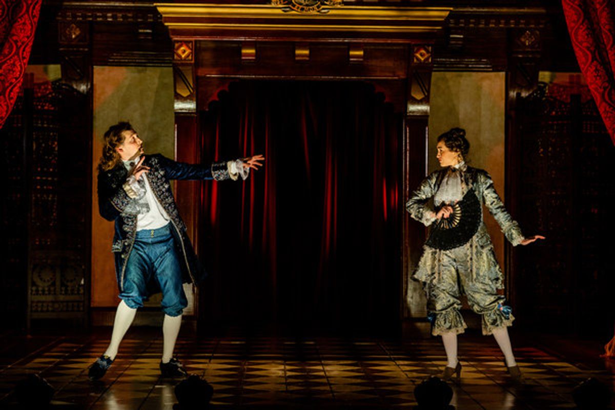 Actor Charles Hart (Quinn Franzen) teaches Nell (Alison Luff) how to communicate the language of the fan at 