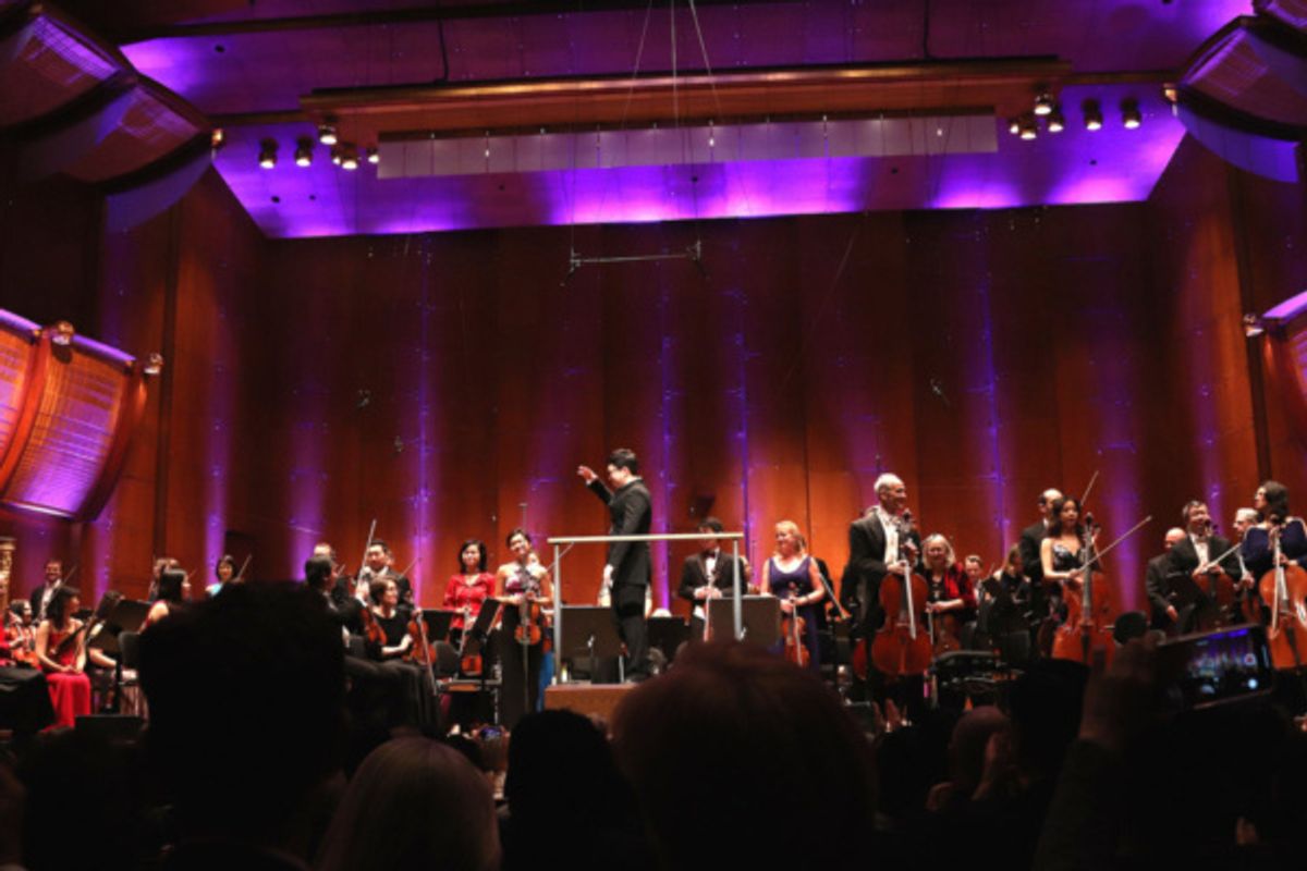 Singaporean conductor Kahchun Wong and the New York Philharmonic musicians at 