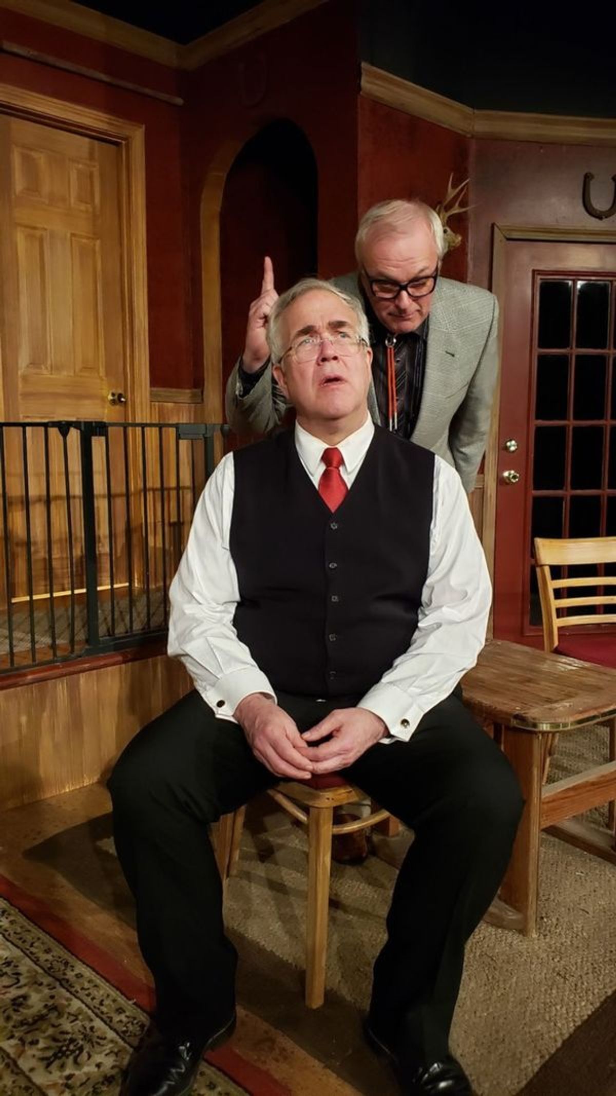 Rick Bagley as Jarvis the butler (seated) and W. Richard Johnson as Mr. Oakfield the lawyer in Lone Star Love Potion at 