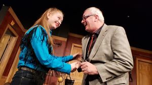 Sarah Reed as Tammy-Jo Harper and W. Richard Johnson as Mr. Oakfield, the lawyer in Lone Star Love Potion @ BroadwayWorld Sarah Reed as Tammy-Jo Harper and W. Richard Johnson as Mr. Oakfield, the lawyer in L Photo