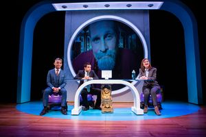 Fred (Ryan Morales), Raj (Bobak Cyrus Bakhtiari*), and Joan (Susi Damilano*) are on a conference call with Jojomon founder John Dale (Craig Marker*).
@ BroadwayWorld Fred (Ryan Morales), Raj (Bobak Cyrus Bakhtiari*), and Joan (Susi Damilano*) are on a Photo