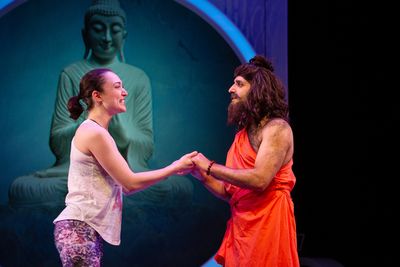 Romola (Ayelet Firstenberg*) is stunned to meet Guru Raj (Bobak Cyrus Bakhtiari*).
 Photo