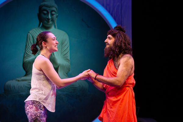 Romola (Ayelet Firstenberg*) is stunned to meet Guru Raj (Bobak Cyrus Bakhtiari*).
 Photo