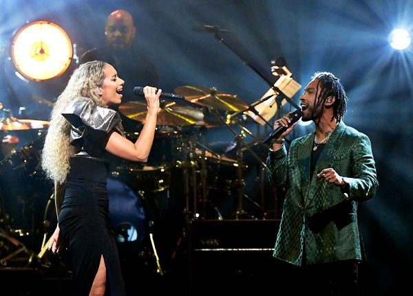 LAS VEGAS, NEVADA - MARCH 16: Leona Lewis (L) and Miguel perform during the 23rd annu Photo