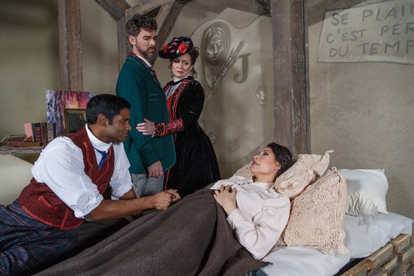 Rodolfo (Sean Panikkar) comforts MimÃ¬ (Nicole Cabell) while Marcello (Craig Verm)  Photo