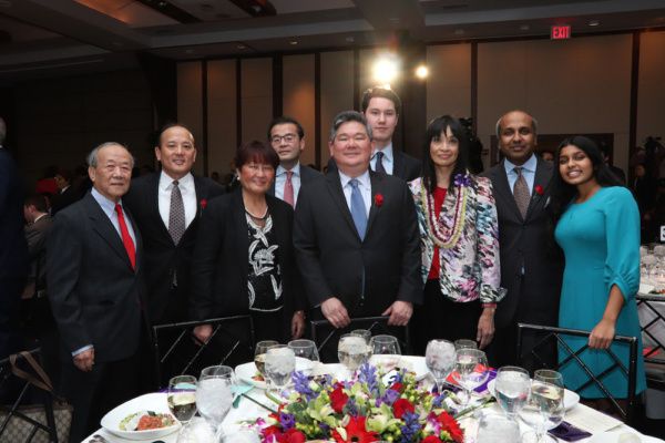 Richard Wu; honoree Michael C. Wu; Helena Wu; Richard Kim, partner at Wachtell, Lipto Photo