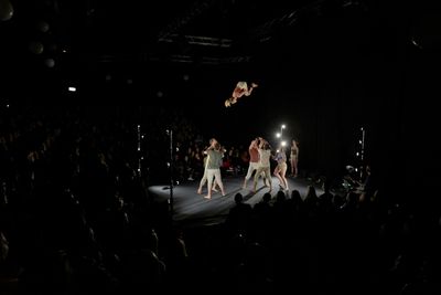 Benton Adams-Walker and Simon McClure (left base), Annalise Moore (flyer), Chris Carl Photo