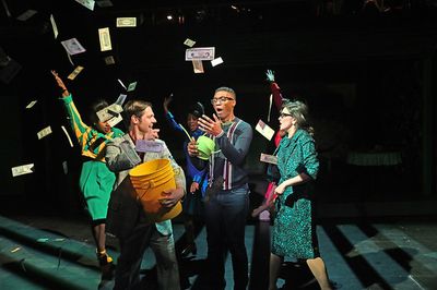 Jude Sandy as Seymour, with the cast of Little Shop of Horrors.  Photo
