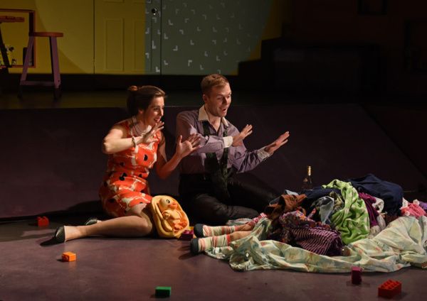 Helen (Elise Marie Davis) and John (Tyler Anthony Smith) try to entertain their young Photo